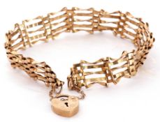 Modern 9ct gold gate bracelet, five bar design with heart padlock and safety chain fitting, 6gms