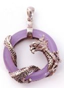 A 925 white metal dragon purple crystal openwork pendant, 25mm diam,