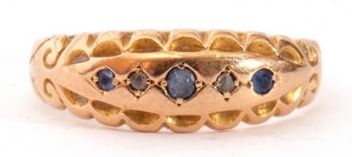Edwardian 15ct gold, sapphire and diamond ring, alternate set with small graduated sapphires and two