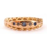 Edwardian 15ct gold, sapphire and diamond ring, alternate set with small graduated sapphires and two