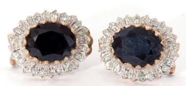 Pair of modern 9ct gold diamond and synthetic sapphire earrings, the faceted oval sapphires in a cut