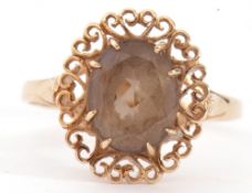 9ct gold smoky quartz ring, the oval shaped faceted quartz,10 x 8mm, multi-claw set within pierced