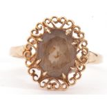 9ct gold smoky quartz ring, the oval shaped faceted quartz,10 x 8mm, multi-claw set within pierced