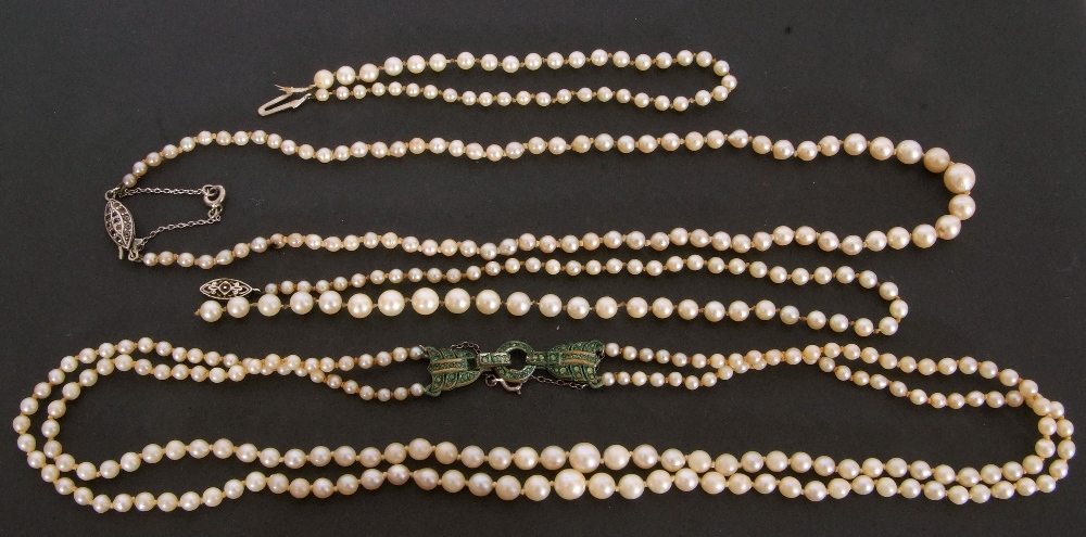 Mixed Lot: single row of graduated cultured pearls with a sterling silver clasp, a similar row of