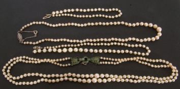 Mixed Lot: single row of graduated cultured pearls with a sterling silver clasp, a similar row of
