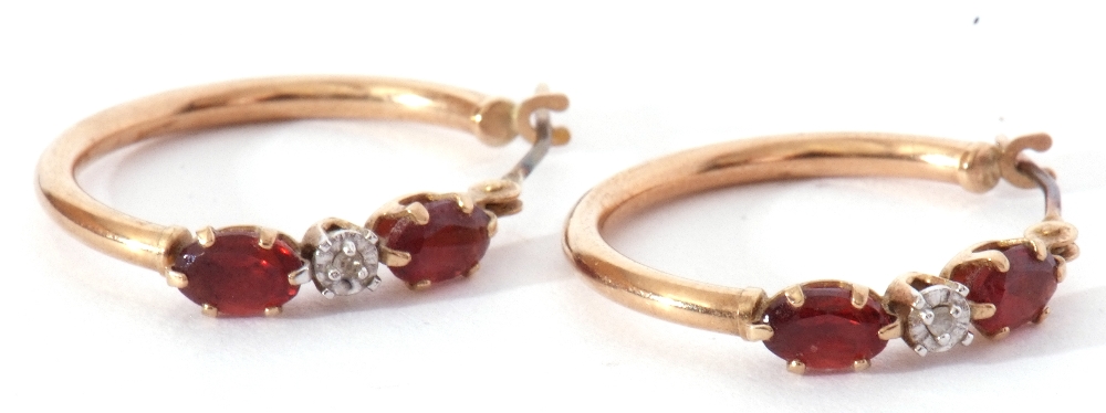 Pair of 9ct stamped hoop earrings highlighted with central diamond point between two small red - Image 5 of 6