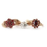 Mixed Lot: two 9ct gold and garnet cluster rings, together with a paste set 9ct gold dress ring, g/w