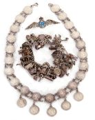 Mixed Lot: white metal charm bracelet, an Indian coin necklace comprising 26 2annas 1893 coins,