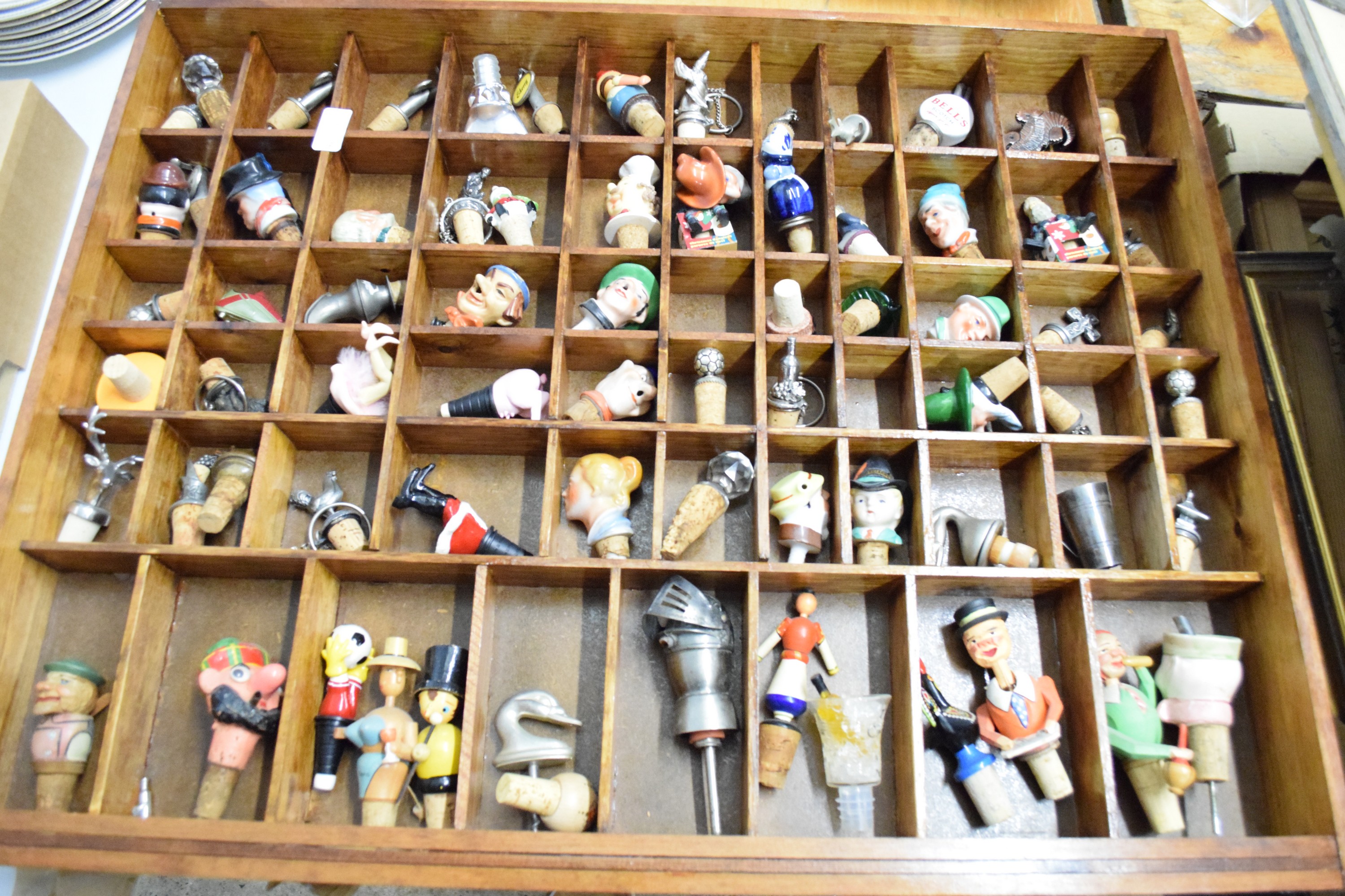 LARGE WOODEN DISPLAY CASE WITH QTY OF BOTTLE STOPPERS, SOME CERAMIC MODELS, FIGURAL HEADS, METAL - Image 2 of 2