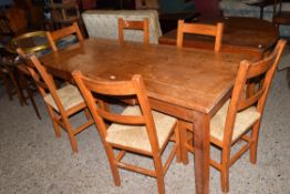 PINE TABLE WITH DRAWER BENEATH, APPROX 76 X 184CM AND A SET OF SIX RUSH SEATED DINING CHAIRS