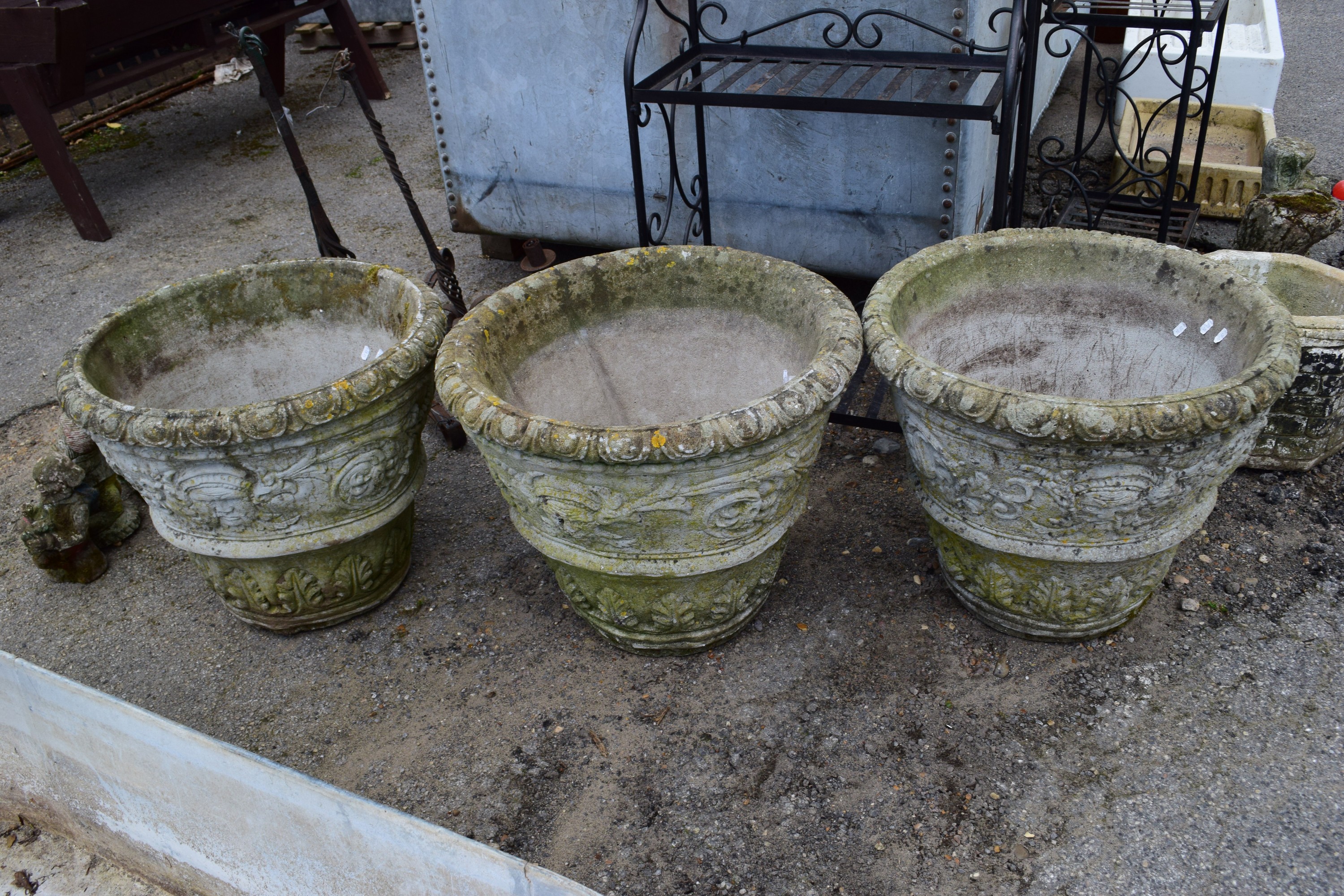 THREE LARGE COMPOSITE PLANT POTS, HEIGHT 48CM, WIDTH 55CM