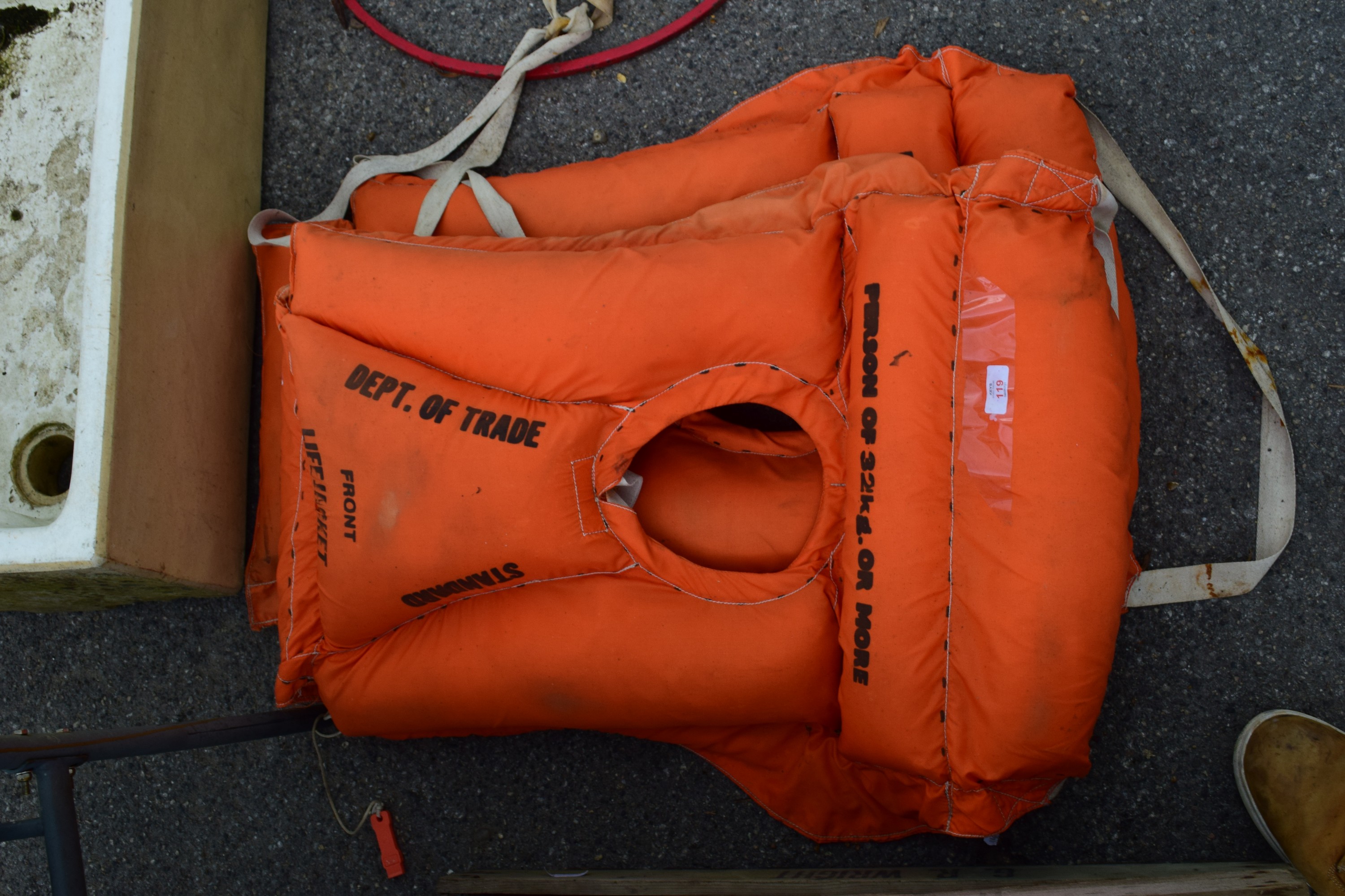 TWO VINTAGE LIFE JACKETS