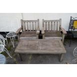 PAIR OF WOODEN GARDEN SEATS WITH A COFFEE TABLE