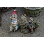 THREE COMPOSITE GARDEN GNOMES