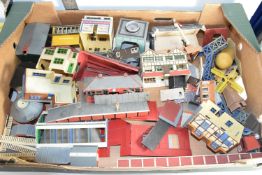 Box containing plastic model railway buildings and a small box of railway scenic items