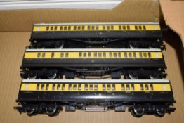 Group of three unboxed Hornby 00 gauge coaches in brown and cream livery