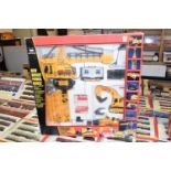 Boxed remote control construction set including controllers