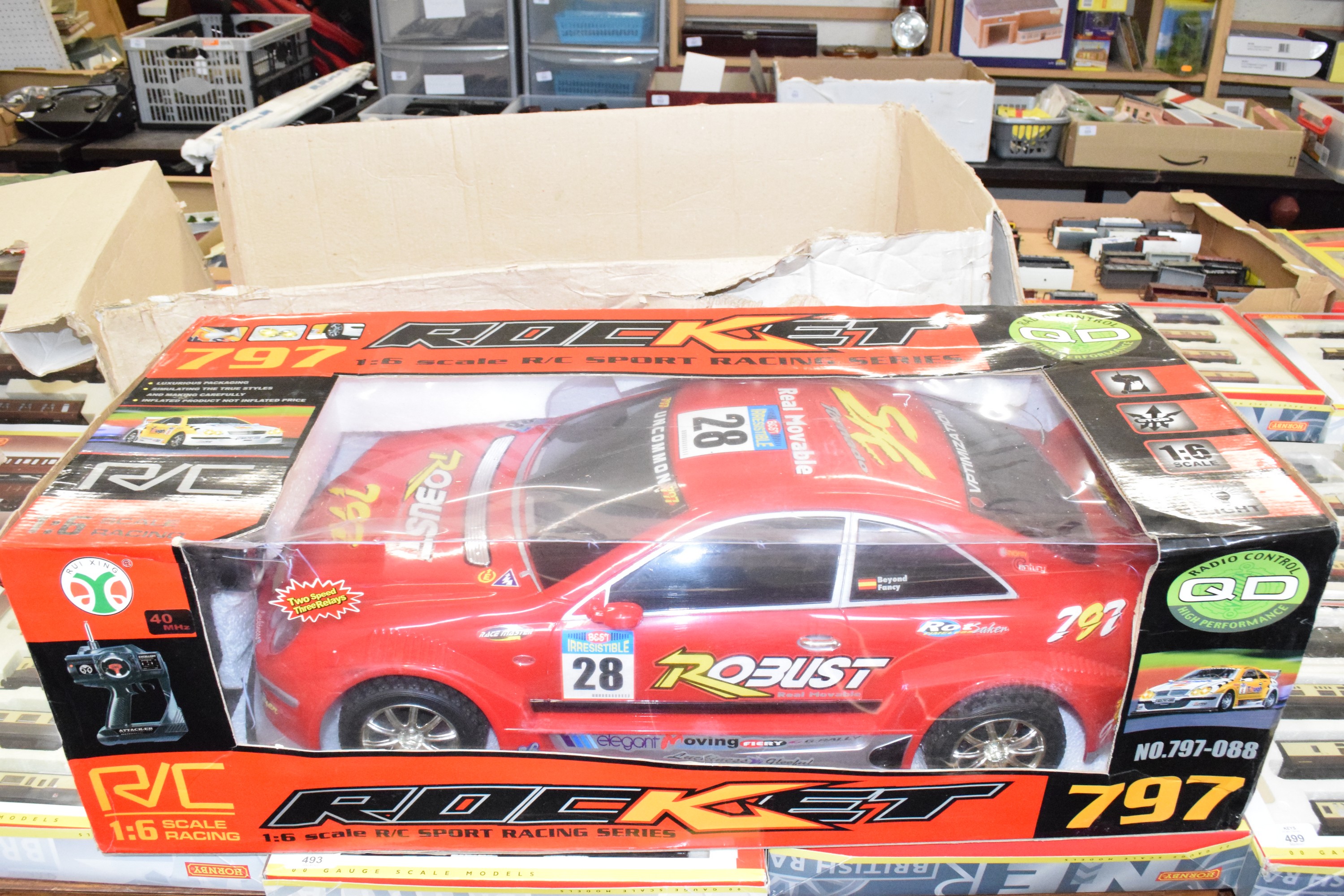 Boxed Rocket 126 scale RC sport racing car in red livery
