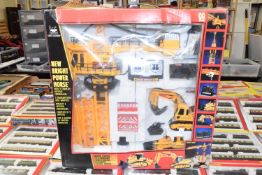 Boxed remote control construction set including controllers