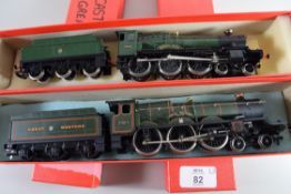 Main Line "Cookham Manor" locomotive No 7808, together with a Airfix GWR Castle class locomotive