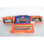 Group of four boxed Hornby and Bachmann 00 gauge goods wagons