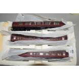 Group of three Hornby 00 gauge coaches including The Caledonian, in styrofoam case (missing cover)