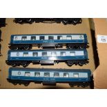 Unboxed 00 gauge group of three Golden Arrow coaches