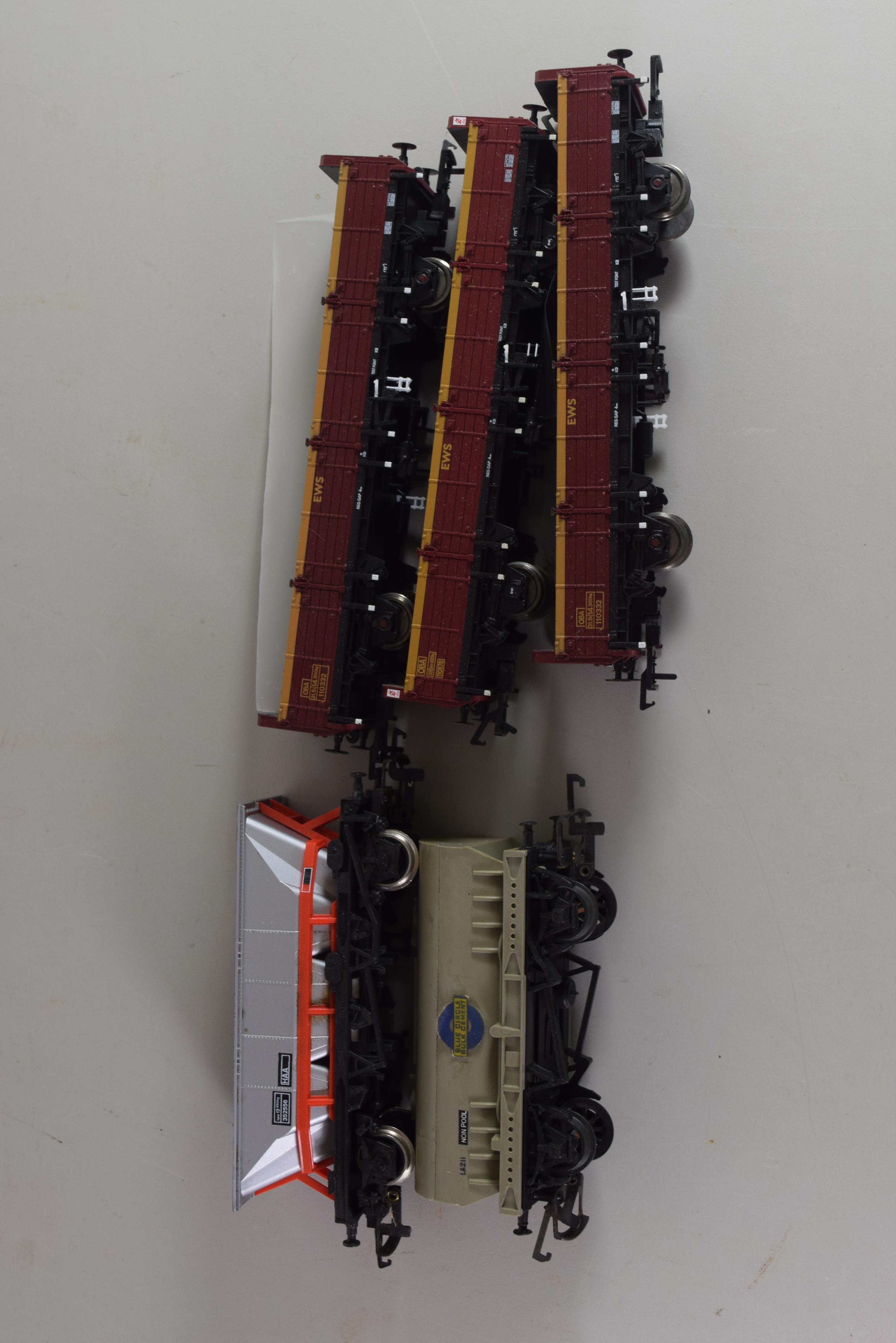 Group of five unboxed 00 gauge goods wagons, various makers