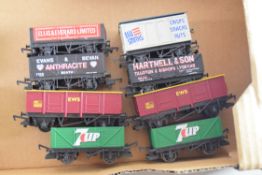 Group of eight unboxed 00 gauge goods wagons to include Mainline, Hornby etc