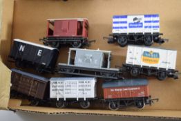 Group of eight goods wagons to include Triang, Hornby, Lima etc