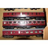 Group of three 00 gauge coaches in red livery to include Triang and Lima