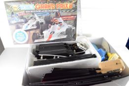 Box containing Scalextric items