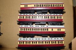 Group of four Hornby 00 gauge coaches in red and cream livery