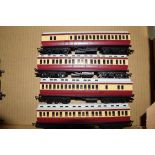 Group of four Hornby 00 gauge coaches in red and cream livery