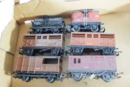 Group of six 00 gauge unboxed goods wagons and tankers to include Triang etc