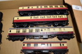 Group of four 00 gauge Hornby plus one other coaches in red and cream livery to include restaurant
