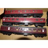 Group of three unboxed 00 gauge coaches to include Triang and Lima in red livery