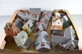 Group of card models of buildings including High St shop, church, terraced houses etc