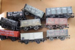 Group of nine mixed goods wagons by Dapol, Mainline, etc