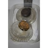 SMALL BOX CONTAINING TWO GLASS INKWELLS WITH BRASS TOP AND CRICKETING MOTIF