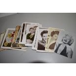 WALLET CONTAINING PHOTOGRAPHS OF FILM STARS FROM THE 1930S INCLUDING MARILYN MONROE