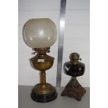 TWO BRASS OIL LAMPS, ONE WITH WHITE GLASS SHADE