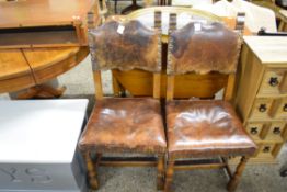 PAIR OF LEATHER UPHOLSTERED CHAIRS