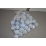 PLASTIC BAG CONTAINING 50 GOLF BALLS