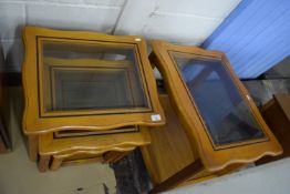 SET OF THREE NESTING GLASS TOPPED TABLES AND ONE LARGER MATCHING ONE