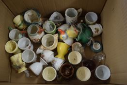 BOX CONTAINING MIXED EGG CUPS, CHARACTER JUGS ETC