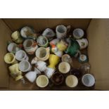 BOX CONTAINING MIXED EGG CUPS, CHARACTER JUGS ETC