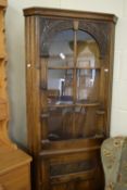 OAK CORNER DISPLAY CABINET WITH CARVED DECORATION, WIDTH APPROX 71CM MAX