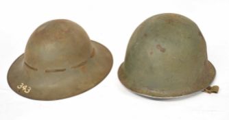 WWII Civil Defence Zuckerman helmet together with further Argentinian M1 helmet (a/f)