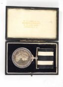 Cased service medal, Order of St John, by H.T.Lamb & Co, impressed to 6125 A/SIS.M.J. Tonge,
